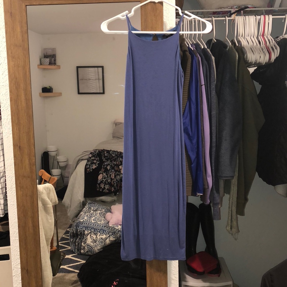 Long tight fitted blue dress with high neck